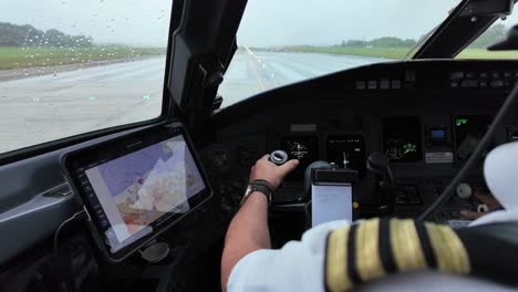 Taking-off-from-a-runway-in-a-rainy-day