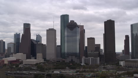 establishing shot of downtown houston on a cloudy day