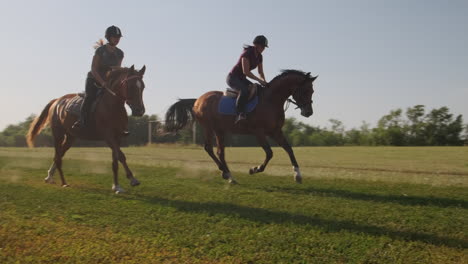 women horseback riding