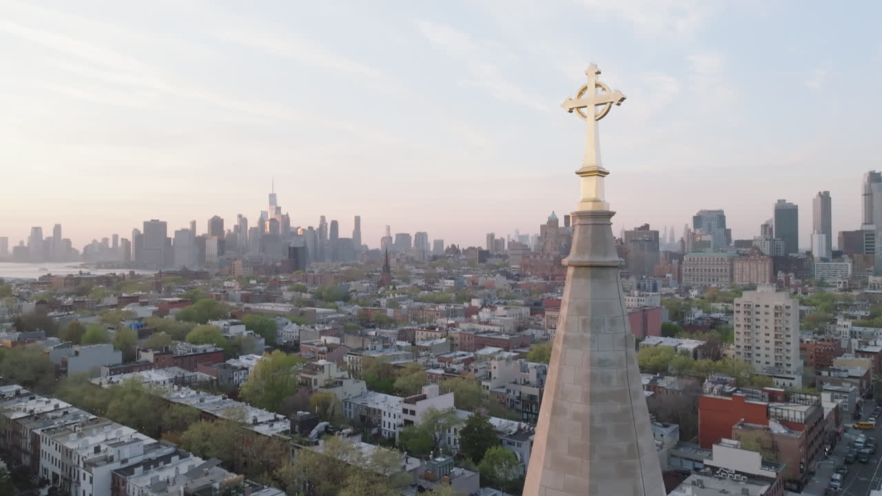 Aerial view of a crucifix on top of a church steeple in New York City