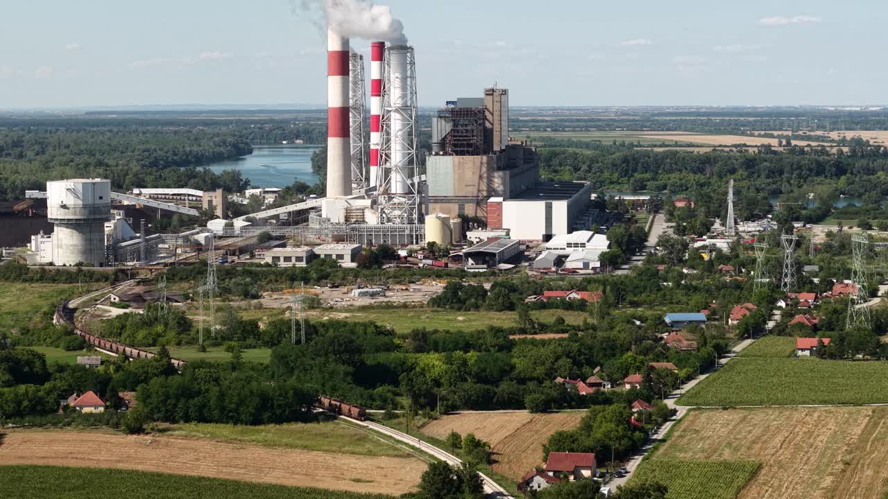 Drone Shot of Coal Fired Power Station, Chimney Towers and Smoke Going Into Atmosphere