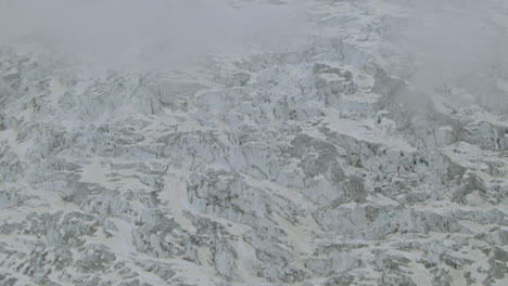 dramatic frozen landscape of the aletsch glacier, switzerland, aerial