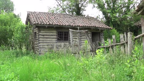 this is a footage of abandoned hut and old wooden fenc