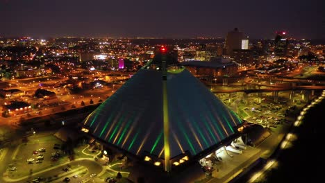 beautiful night aerial shot of the memphis pyramid hernando de soto bridge and downtown memphis cityscape at dusk