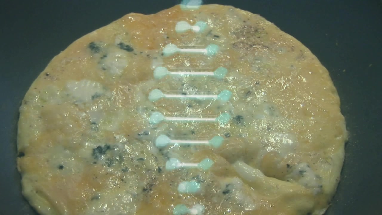Cyan-white helix initiating sweep across omelette, showing cooking changes and marking doneness