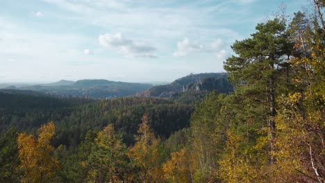 Colorful-autumn-forest-in-mountains-of-Saxon-Switzerland,-Germany