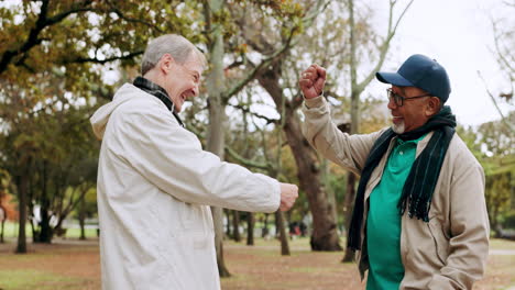 senior people, fist bump and forest hiking