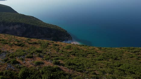 Soaring-Over-Albania's-Coastline:-Mountains,-Secluded-Beaches,-and-Blue-Ionian-Sea-in-Stunning-Aerial-Views