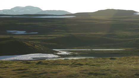 traveling-through-the-wild-fields-of-Wilderness-road-in-Stekenjokk,-north-of-Sweden