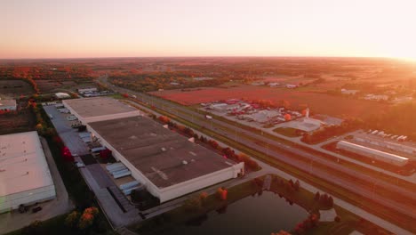 amazing drone shot of beautiful fall season of trucking business in usa