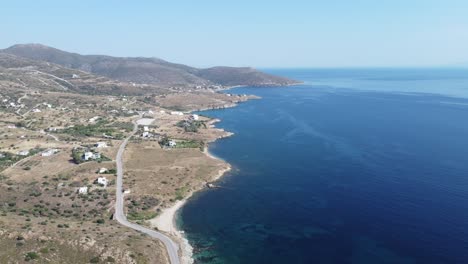 Curvy-shoreline-of-the-Aegean-sea-in-Evoia,-Greece-|-Drone-shot-of-a-coast-and-clear-blue-sea-|-4K