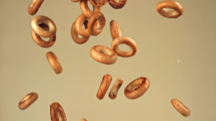 Golden Brown Baked Goods Falling in Slow Motion