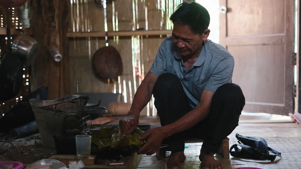 Man cooking food indoors
