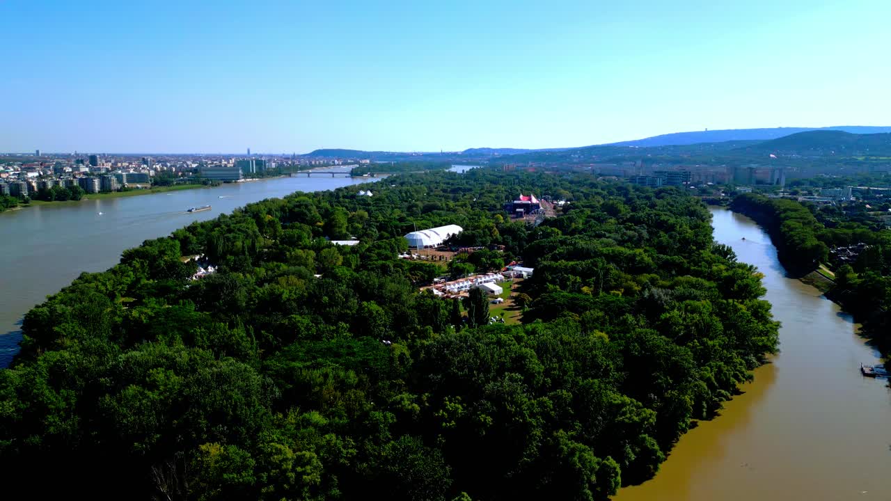 Aerial View Over Location Of Sziget Festival In &Oacute;buda Island, Budapest, Hungary - drone shot