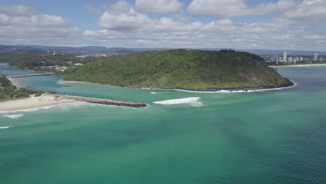 waves in the ocean at tallebudgera creek - burleigh mountain and palm beach - aerial shot