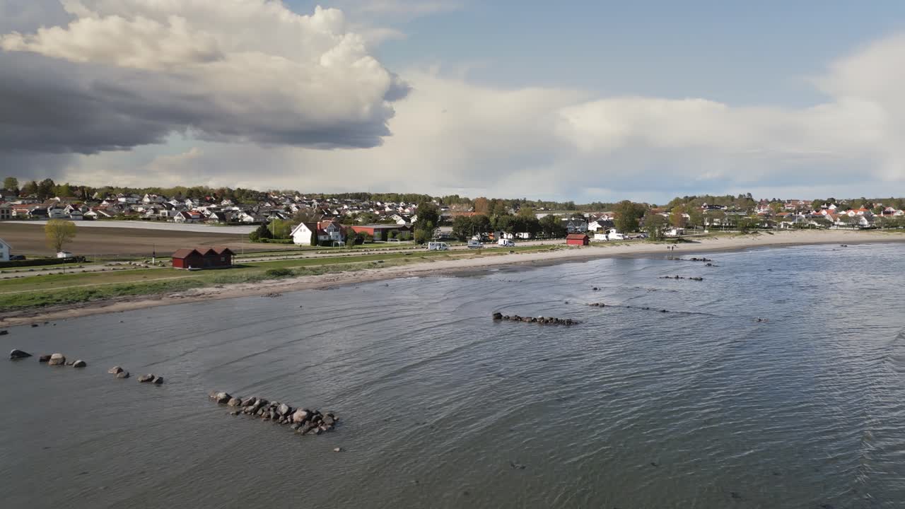 Aerial drone shot over Ringshaugstranda a beach located near Tønsberg in Norway.