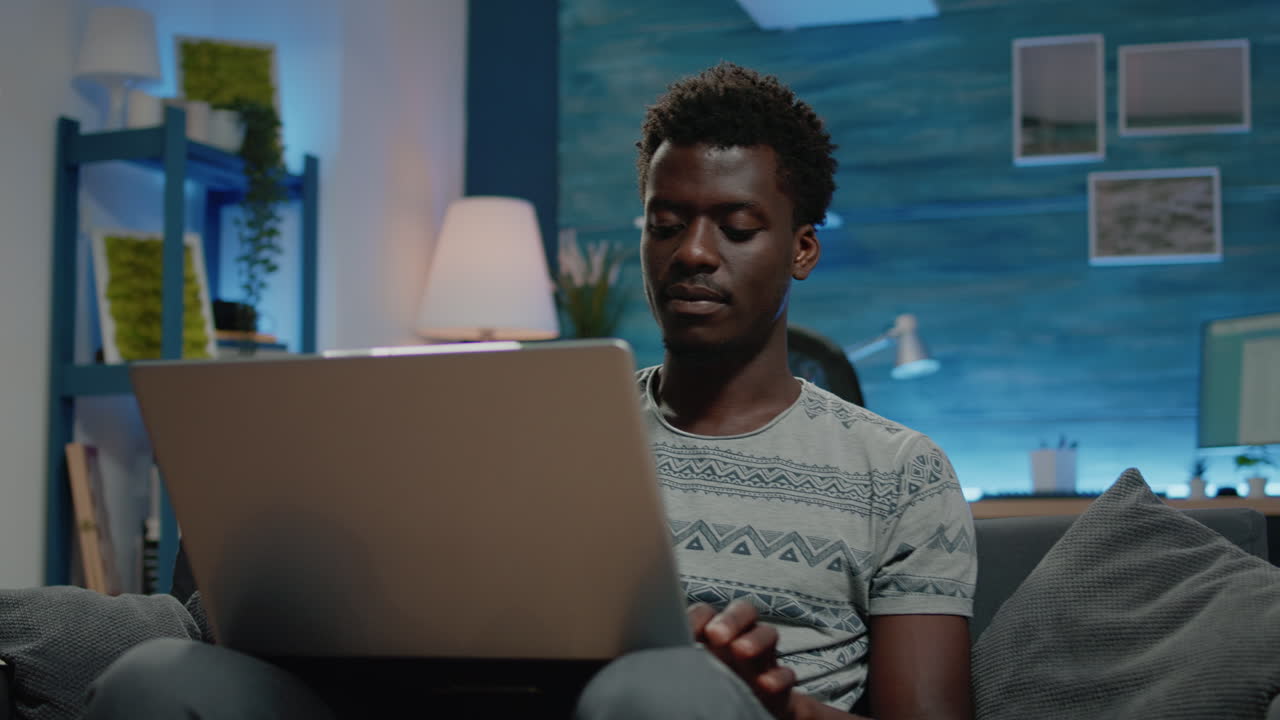 Close up of business person using laptop for remote work