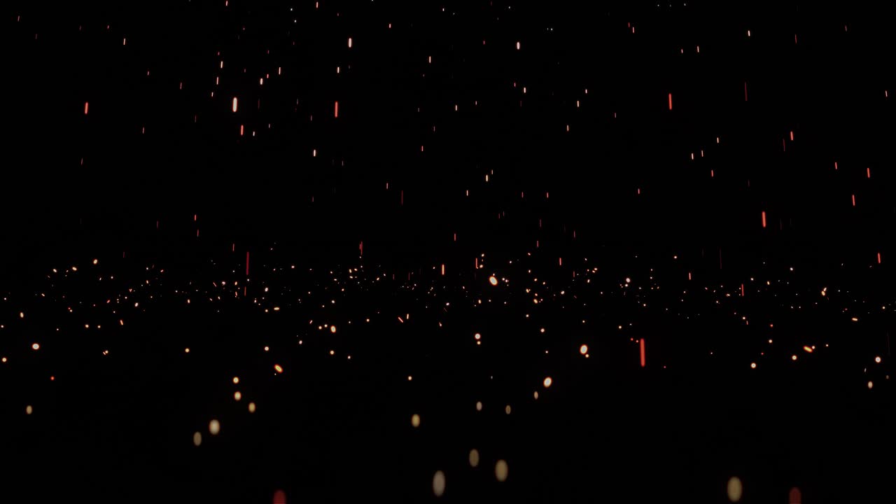 바닥에 떨어지는 황금빛 불꽃의 비