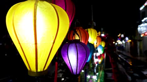 vibrant lanterns light up a bustling street