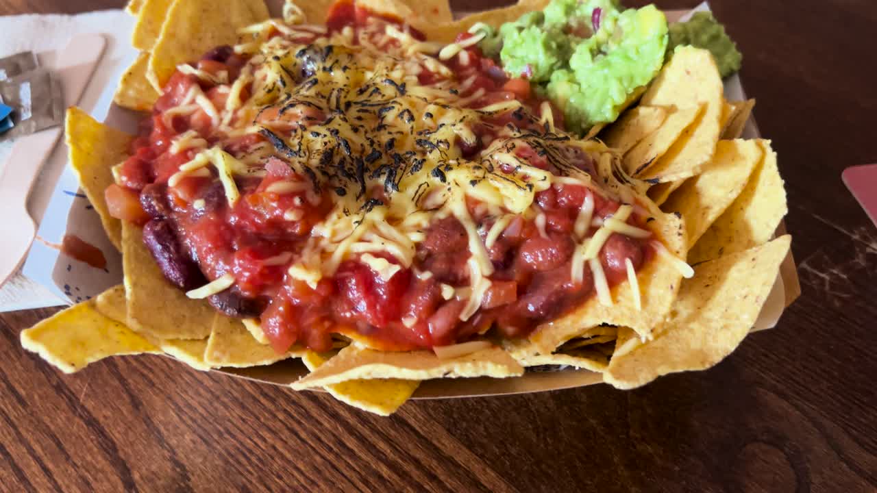 Big Portion Loaded Nachos Cheese Beans and Guacamole