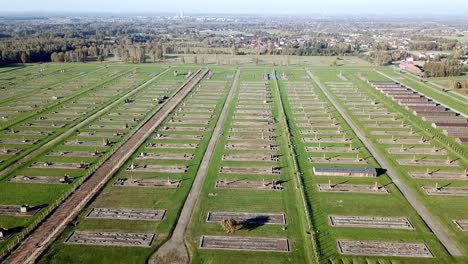 Drone-pull-back-shot-of-the-barracks-in-Auswitz-Birkenau,-Poland,-Europe