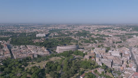 wide aerial shot of the colosseum in rome, italy