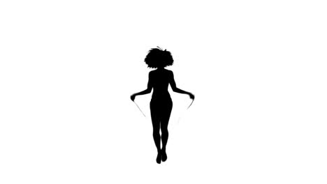 silhouette woman exercising with a skipping rope