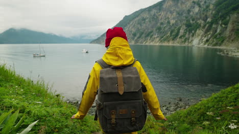 woman hiking along the coastline