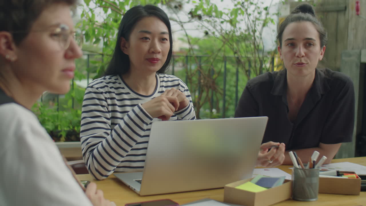 Team Meeting with Laptop