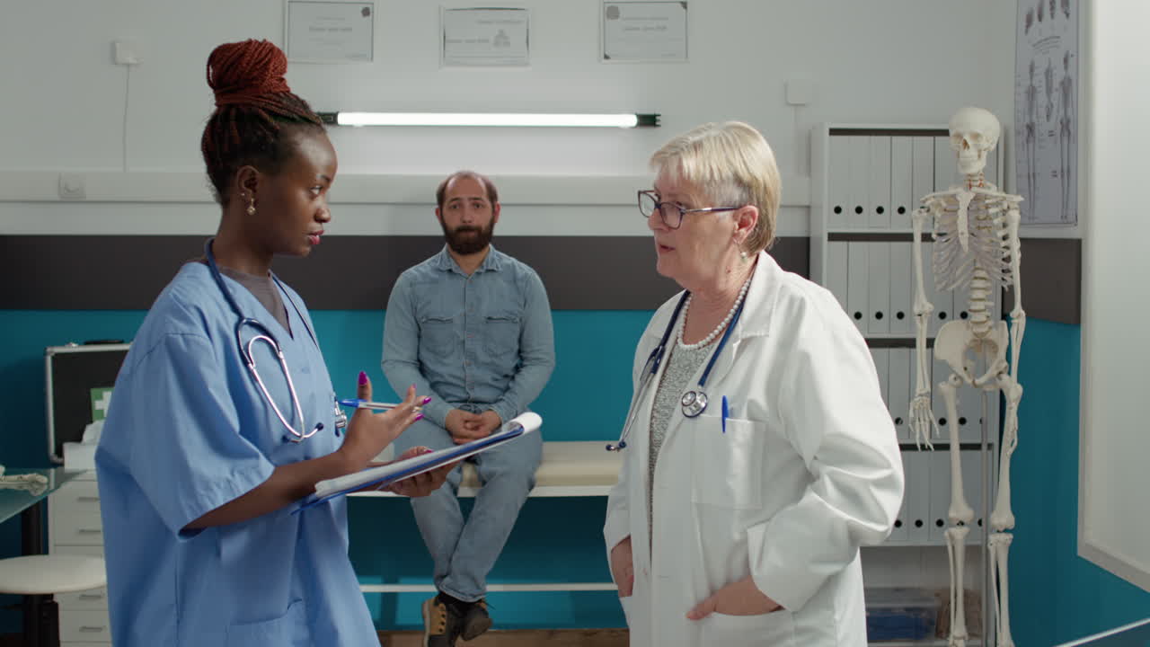 Diverse medical team talking about health care diagnosis