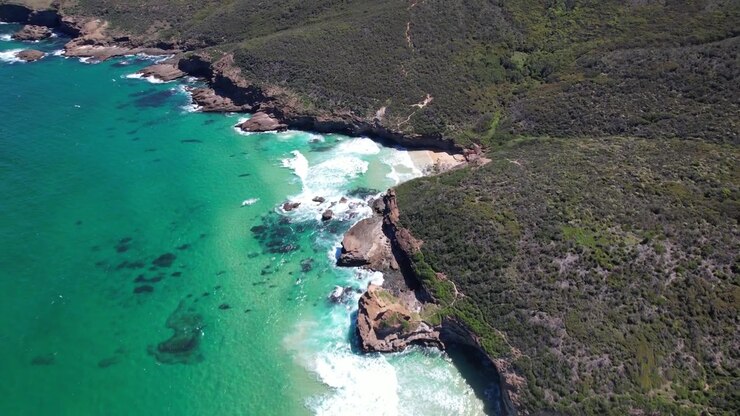 Timber Beach y Maktub Rock en Moonee, NSW, Australia - Toma aérea