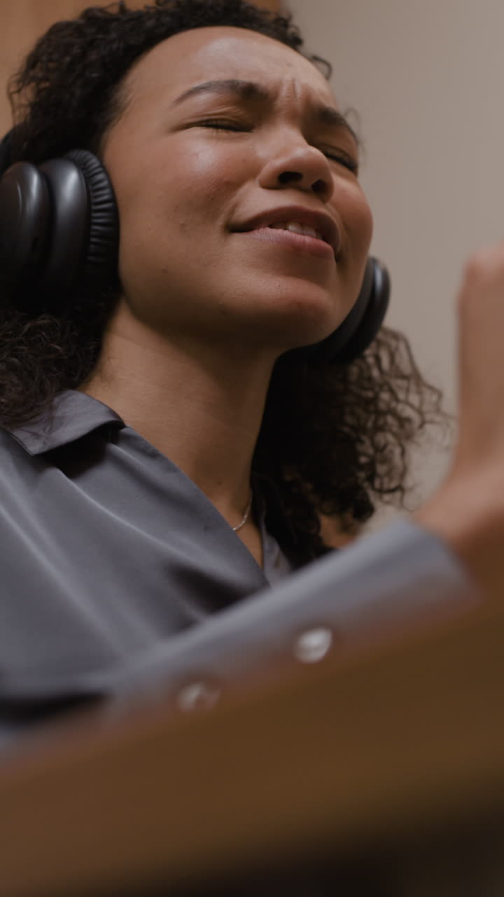 Woman with headphones listening to music