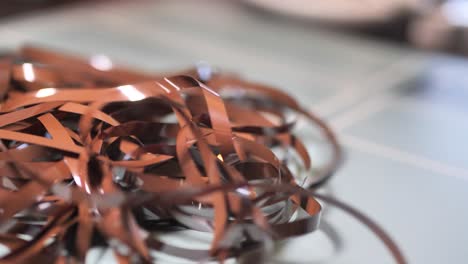 tape unreel. pulling the tape out. destroying cassette tape media. slide a