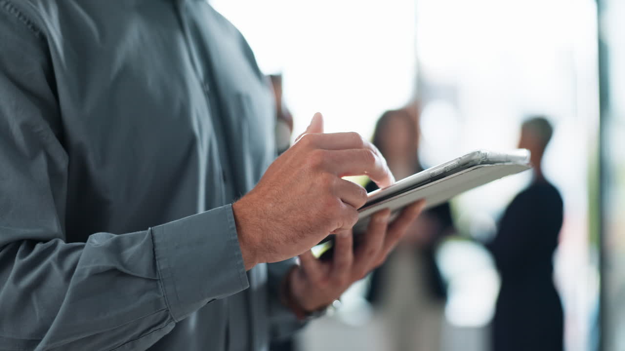 Man using tablet in business setting