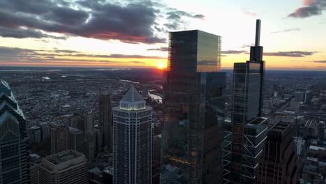 aerial turn of urban city skyline at dusk sunset