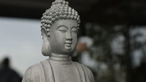 grey buddha statue