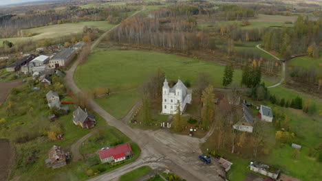 Orbiting-around-a-chaotic-Church-in-Latvia,-near-city-of-Rezekne