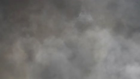 Storm Clouds Lightning in dark sky background