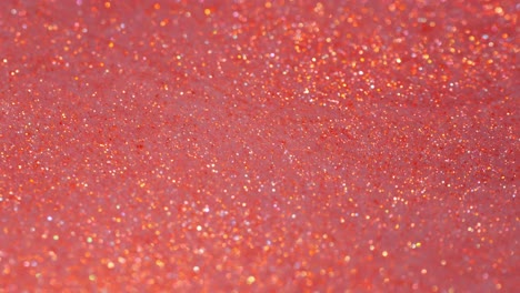orange golden dust macro bubbles in galactic ink flow – abstract blue motion