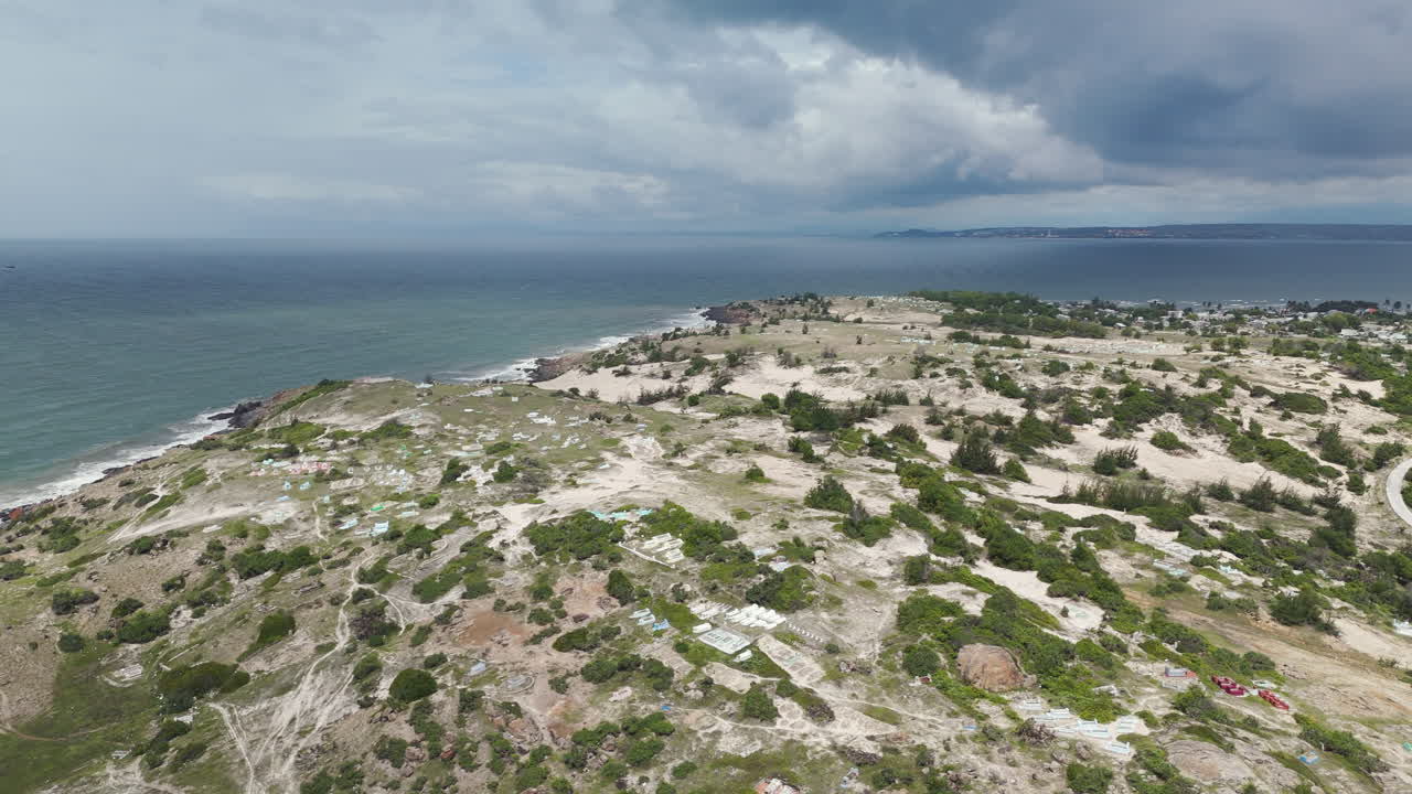 Aerial view of wilderness nature on the coastline near Mũi N&eacute; beach resort town Vietnam