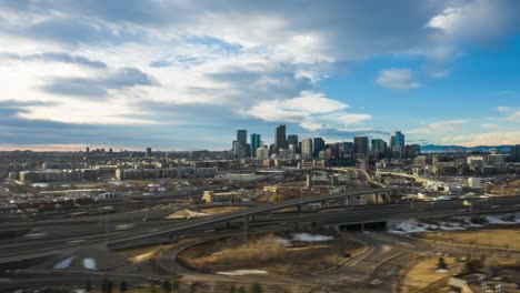 aerial hyper lapse of sunrise in denver colorado with traffic