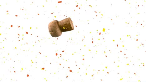 Confetti-falling-over-wine-cork-falling-against-white-background