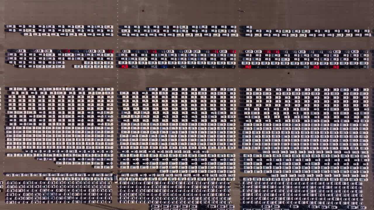 Top-down view of car stock at transport hub, Thailand