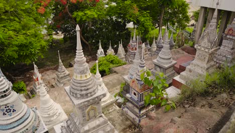 graves at thai buddhist temple in koh samui