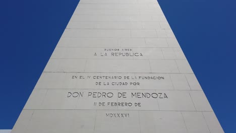 obelisk of buenos aires argentina white high monument close up, brick scripture of argentine independence city foundation