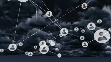 Animation-of-network-of-connections-with-people-icons-over-sky-with-clouds