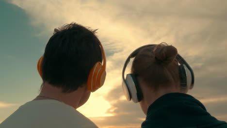 couple listening to music outdoors