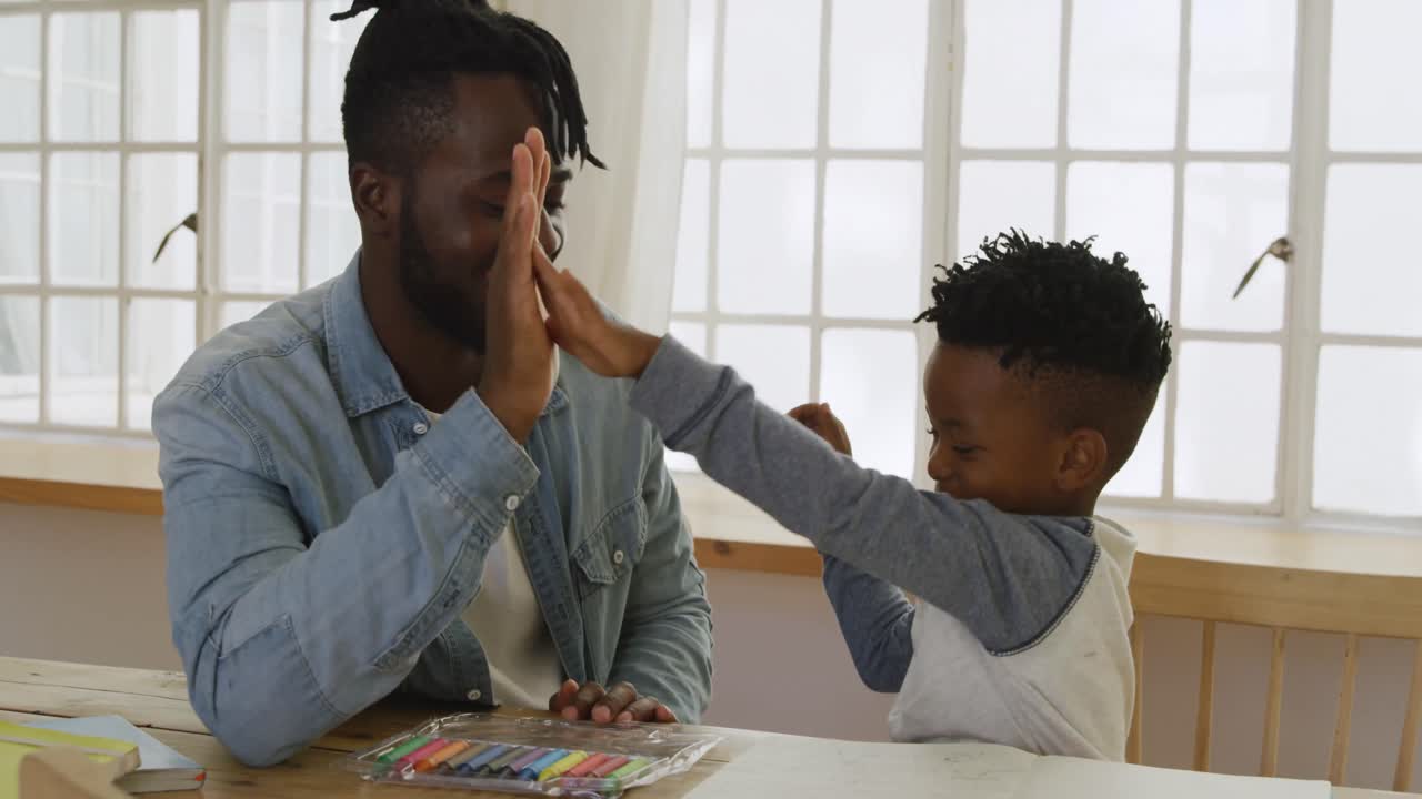 Father and son at home
