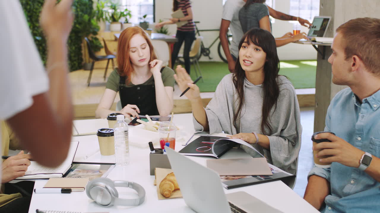 Creative startup meeting, office team asking