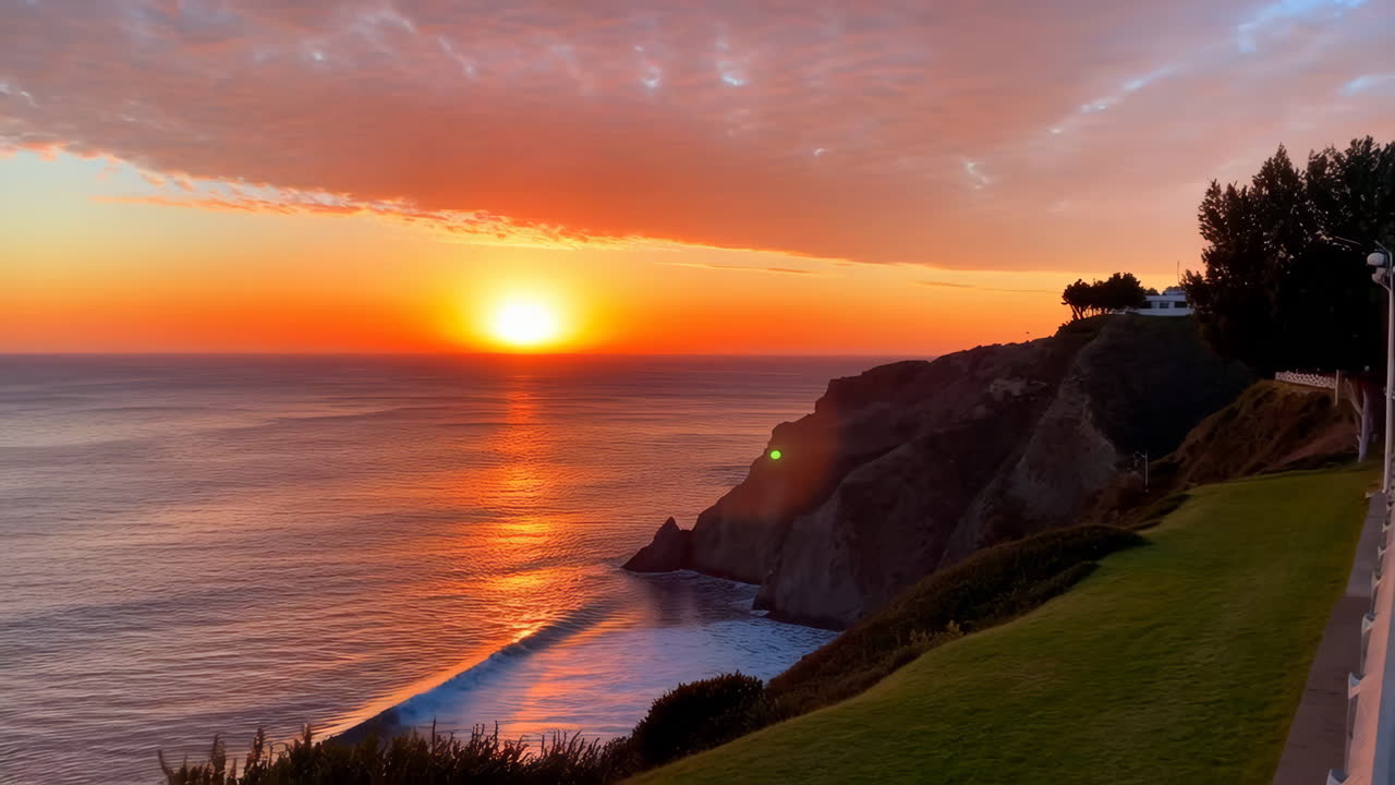Vibrant Sunset over Coastal Cliffs and Ocean